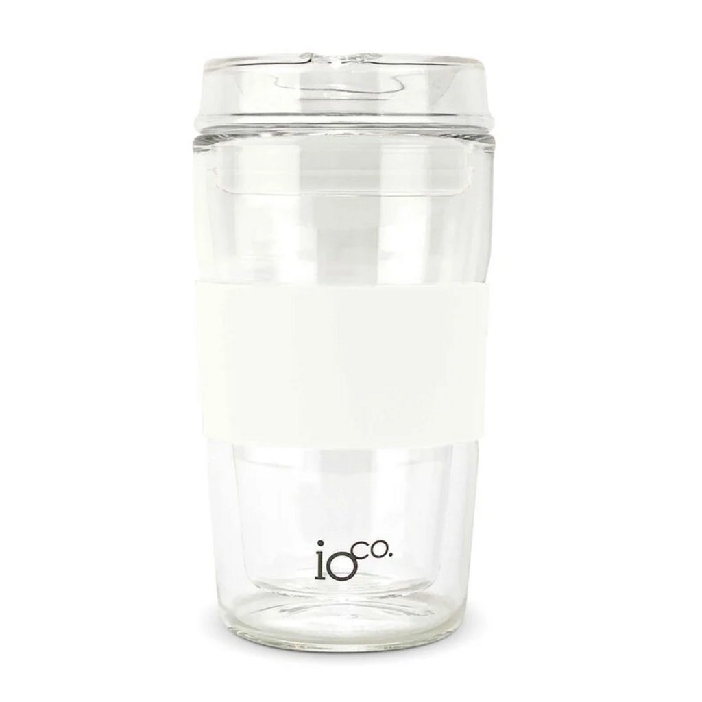 IOco all-glass travel cup in Snow White, with a clear glass lid, matching silicone seal and grip sleeve, shown on a white background. Lorikeet Living